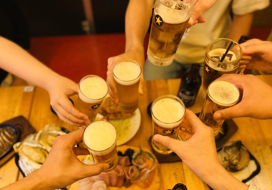 Japanese Food Experience Night Tour in Ueno - The core plan: around 9 dishes, multiple restaurants, and a ramen finish