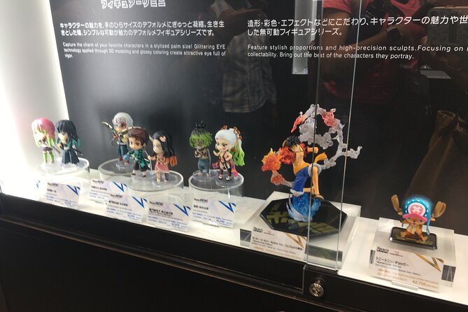 Private Akihabara Anime Guided Walking Tour - Stop 2 at Animate Akihabara: figures, collectibles, and shelf after shelf of fandom