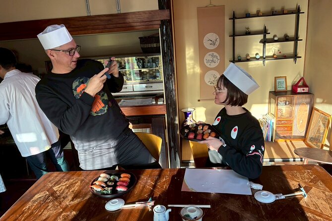 Sushi Making in a Century Old Kamakura Home - Optional sake and the included calligraphy canvas
