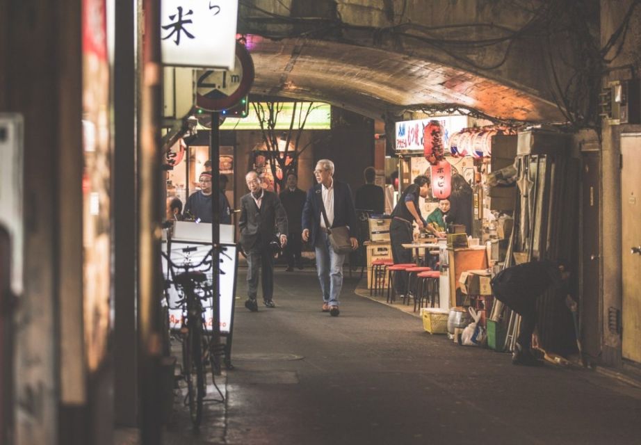 Tokyo After 5: Local Eats, Drinks & Culture Walk - Tsukishima Monja Town: sitting at the hotplate and learning Monja-yaki