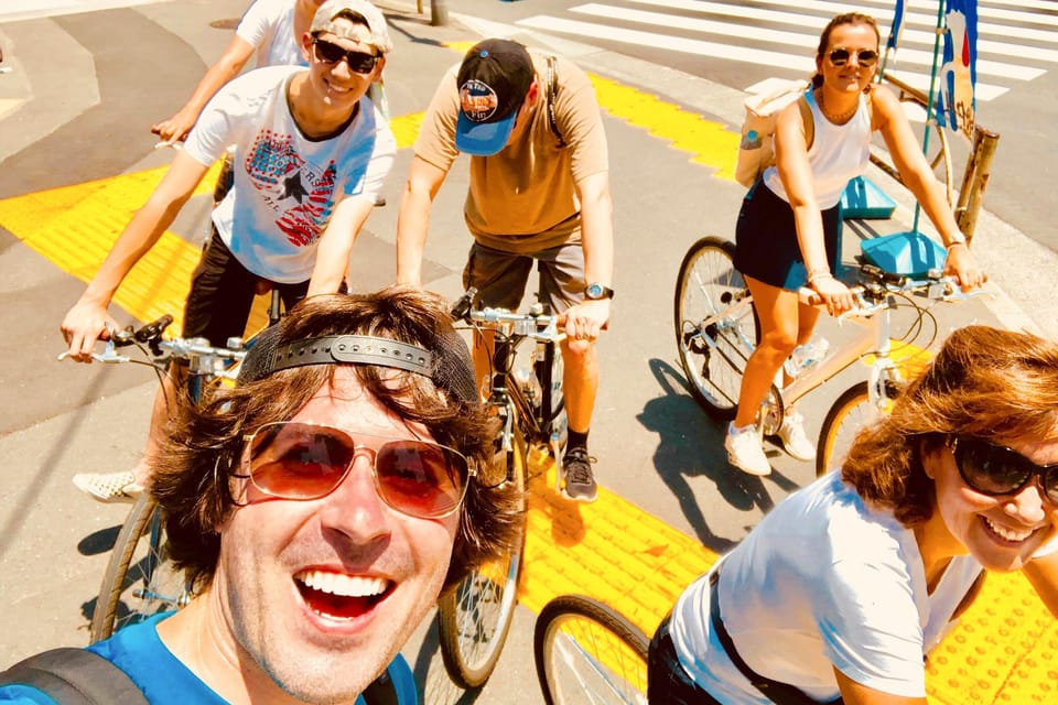 Tokyo: Hidden Gems Guided Bike Tour with Lunch - Riding the Sumida River: sky-high views and Sumo-town energy