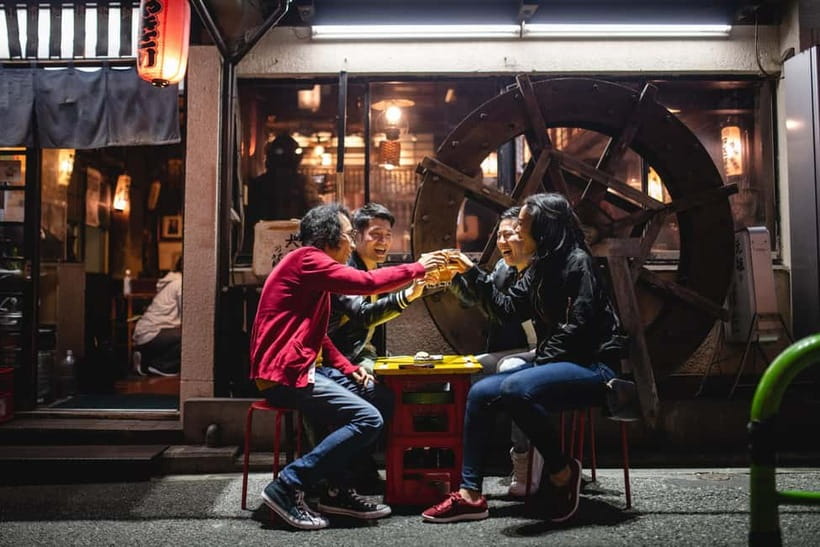 Tokyo: Shibuya Food Tour, Neon Lights & Local Flavors - Entering Shibuya after dark: Hachiko to the scramble