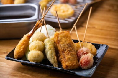 Tokyo: Shibuya Food Tour, Neon Lights & Local Flavors - Shibuya Crossing stops and konbini snack tasting