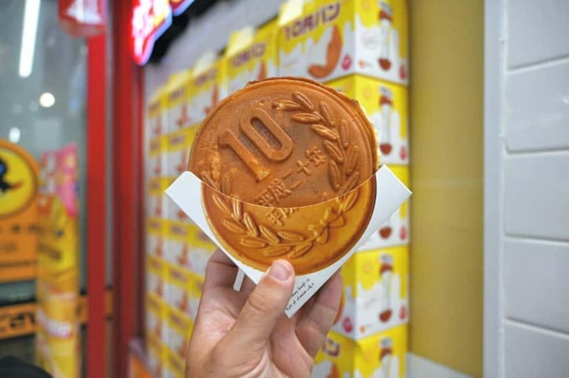 Tokyo: Shibuya Food Tour, Neon Lights & Local Flavors - Hidden onigiri stand and the sponge cake moment