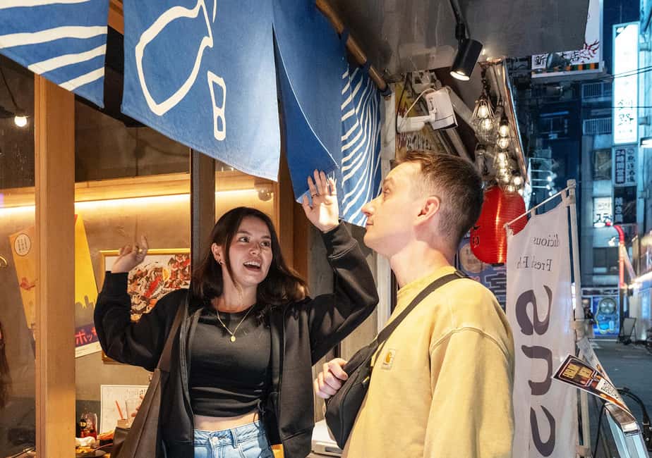 Tokyo: Shinjuku Nightlife Tour with Karaoke and Bar Hopping - Kabukicho Backstreets: Neon Signs Meet Local Context