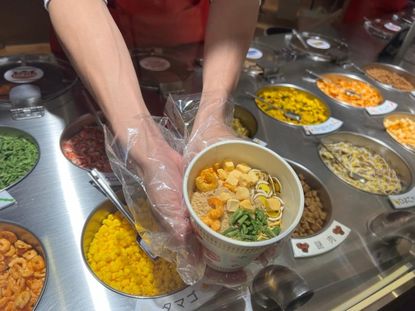 Yokohama: Guided Cup Noodles Museum Tour & Make Your Own Cup - Getting oriented: what the museum guide actually does